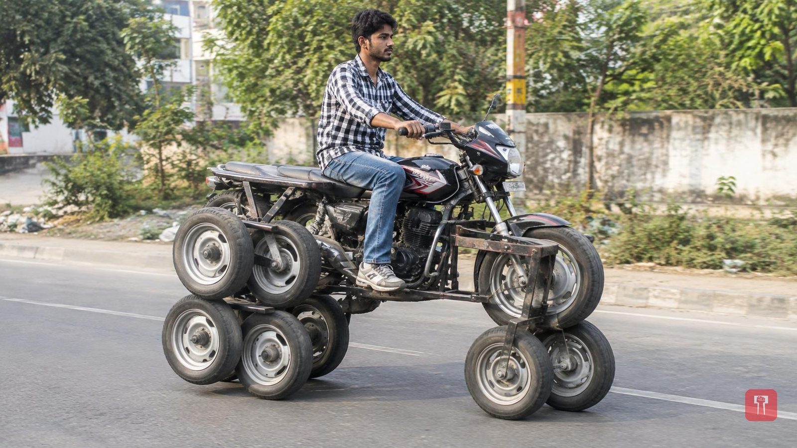 Young man builds six-wheeled motorbike, video stuns internet