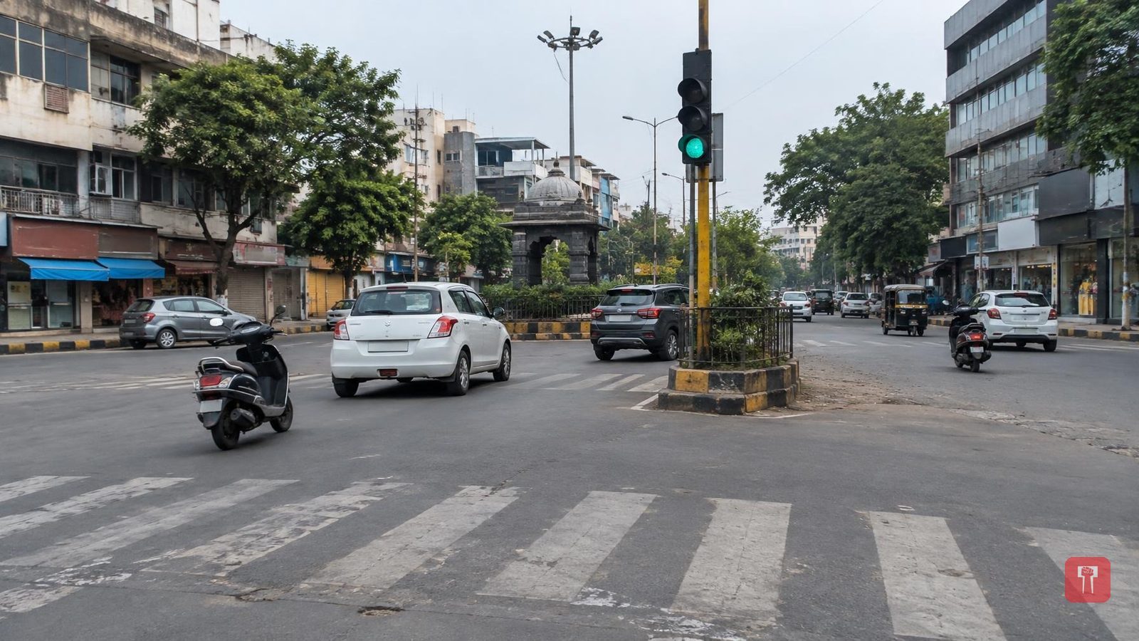 Nashik: Car jumps signal, hits woman biker, driver tries to run down cop